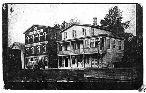Roe's Hall. Circa 1890. (Building on right stands next to railroad station and is #9-11 Winkler Place.) chs-006021